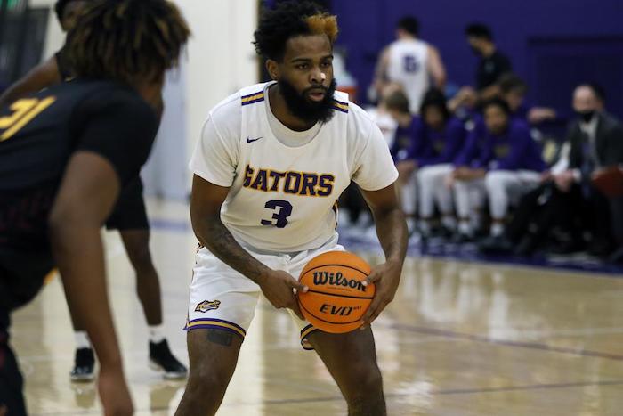 Breyon Jackson playing basketball for SF State