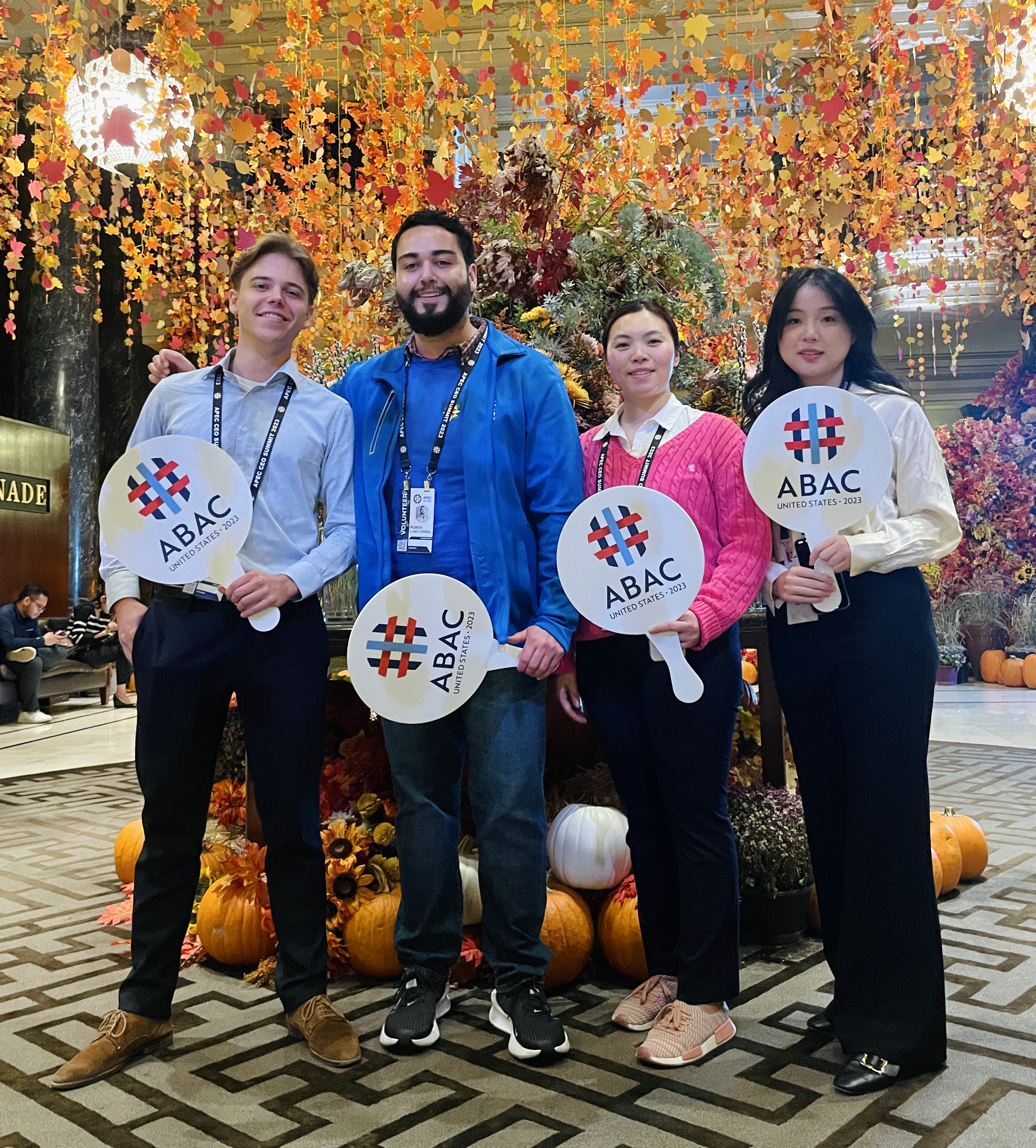 Four students with pickets that read "ABAC United States 2023"